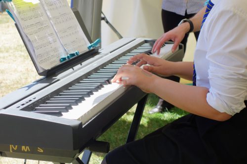 Child playing keyboard