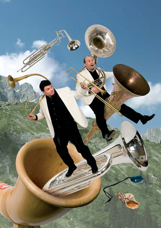 Two men with tubas and brass instruments